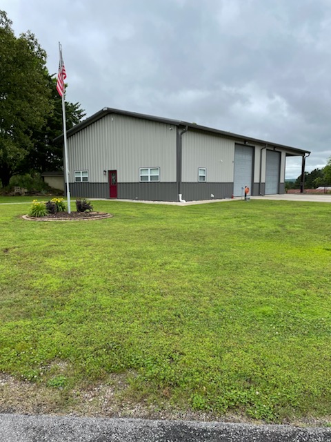 A newly-assembled steel garage and workshop in Arkansas.